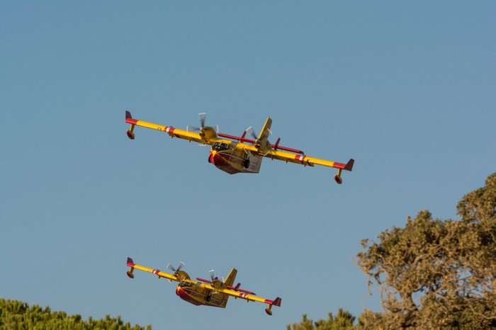 Two Canadair CL-415 firefighting aircraft in flight