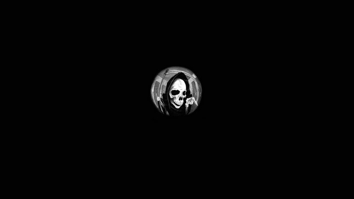 Grim Reaper skull with scythe in a circle