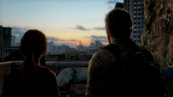 Ellie and Joel from The Last of Us overlooking a city at sunset
