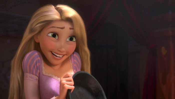 Rapunzel from Tangled holding a frying pan