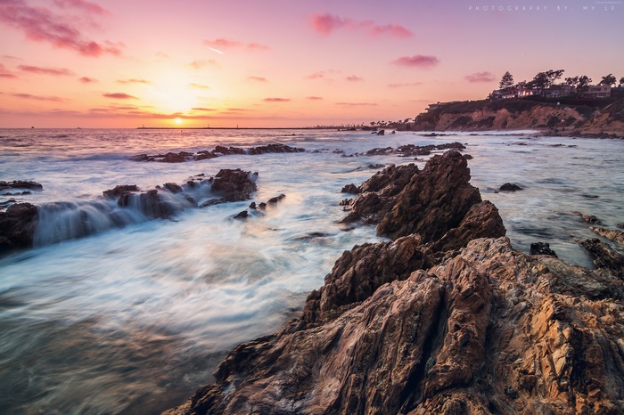 Sunset over the ocean at Corona Del Mar, California