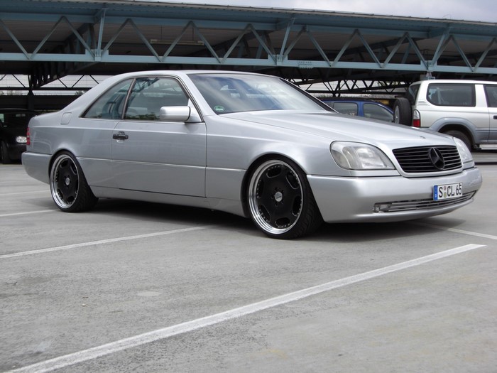 Silver Mercedes-Benz CL 65 Coupe with custom wheels