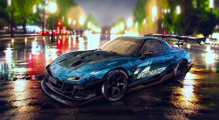 Modified blue Mazda RX-7 Speedhunters on wet street