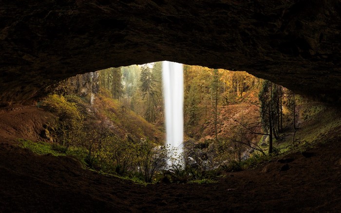 Waterfall seen from inside a cave