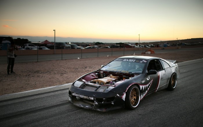 Nissan 300ZX with shark teeth livery on a race track