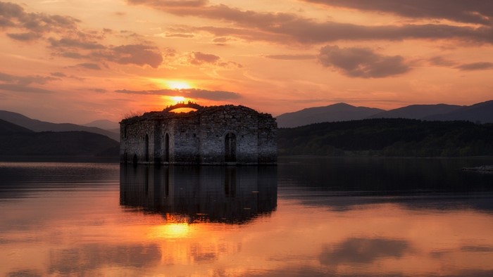 Ruined church in a lake at sunset, Bulgaria