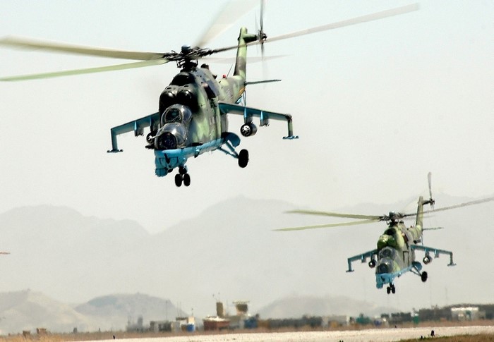 Two Mil Mi-24 Hind helicopters in flight