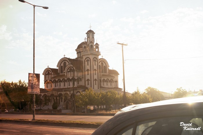 Orthodox Church with a Streetlight and a Car