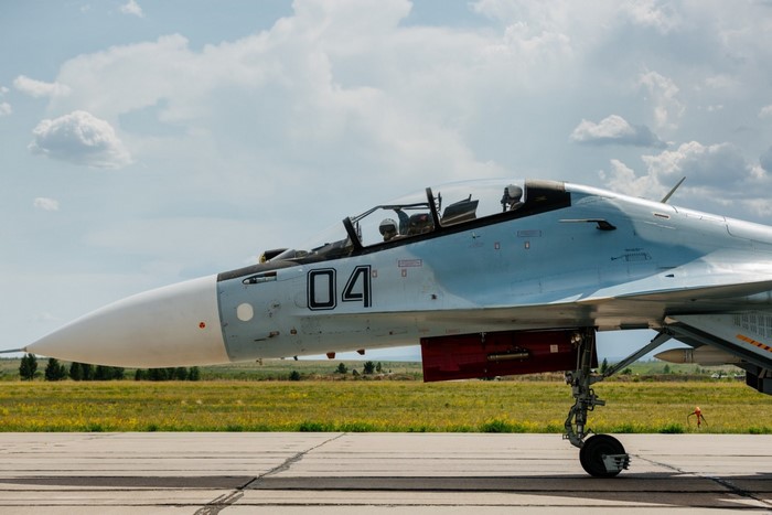 Sukhoi Su-30 fighter jet with number 04