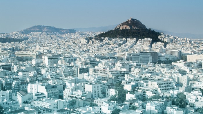 Athens cityscape with Acropolis hill in the background