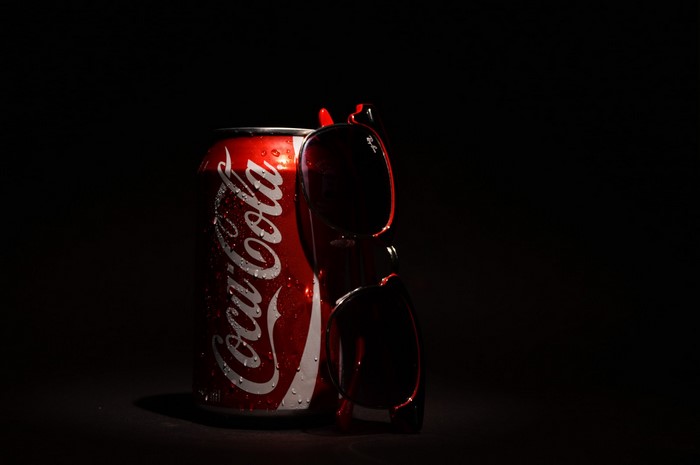 Coca-Cola can with sunglasses