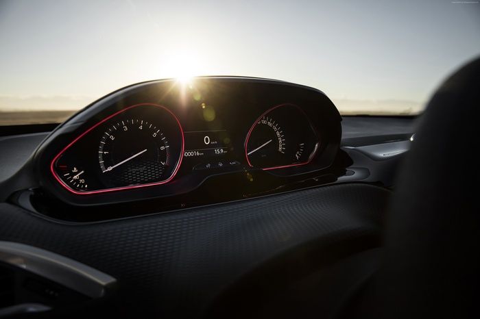 Peugeot 2008 GT Line instrument cluster at sunrise