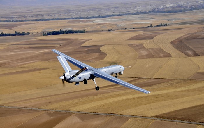Ankara-based Bayraktar drone flying over agricultural fields