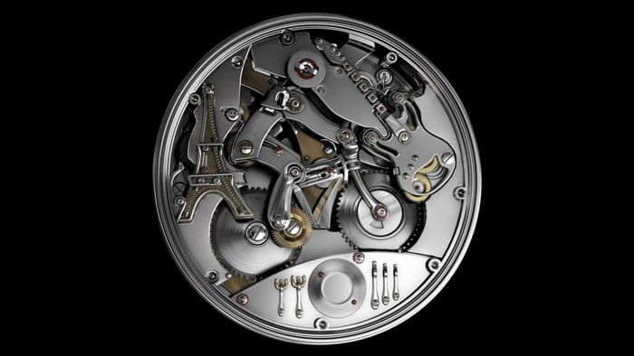 Mechanical watch movement with Eiffel Tower and guitar