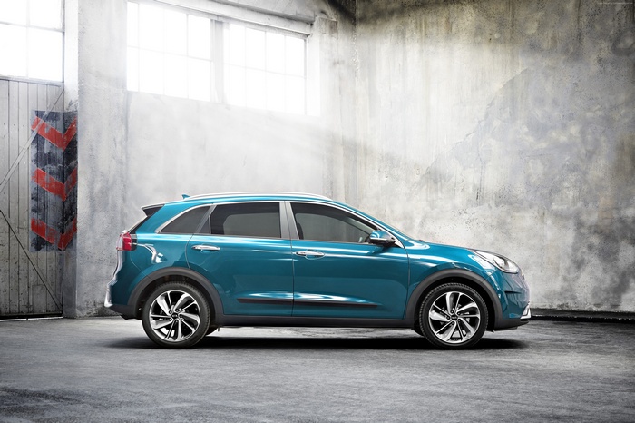 Blue Kia Niro Crossover in a Garage