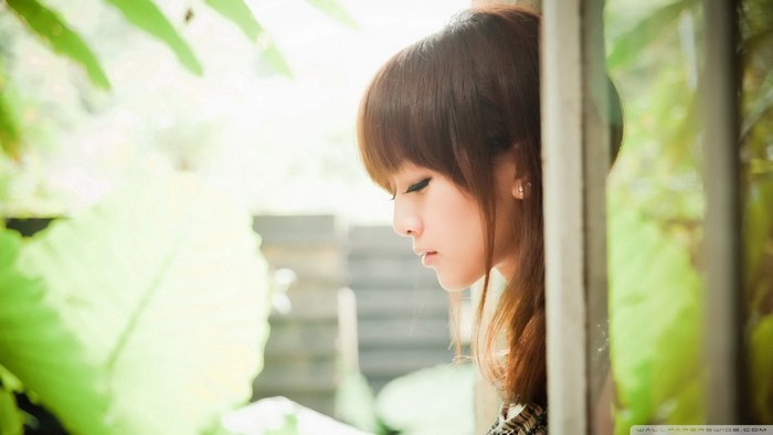 Serene Portrait of a Young Woman in Nature