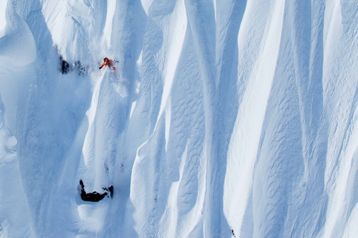 Eirik Finseth skiing down a snowy mountain in Norway