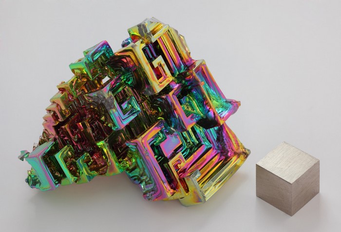 Colorful Bismuth Crystal and Metal Cube