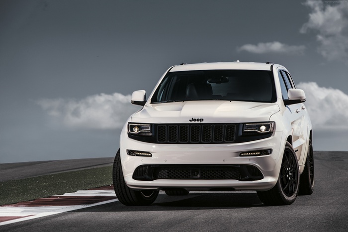 White Jeep Grand Cherokee SRT "Night" on a track