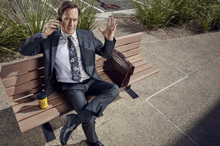 Saul Goodman from Better Call Saul on a bench