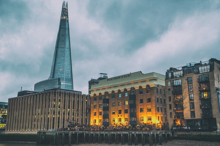 The Shard skyscraper and Pickfords Wharf buildings on the Thames in London
