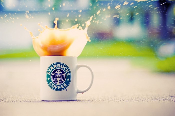 Starbucks coffee cup with splash