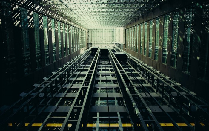 Modern Elevator Shaft with Glass and Sunlight