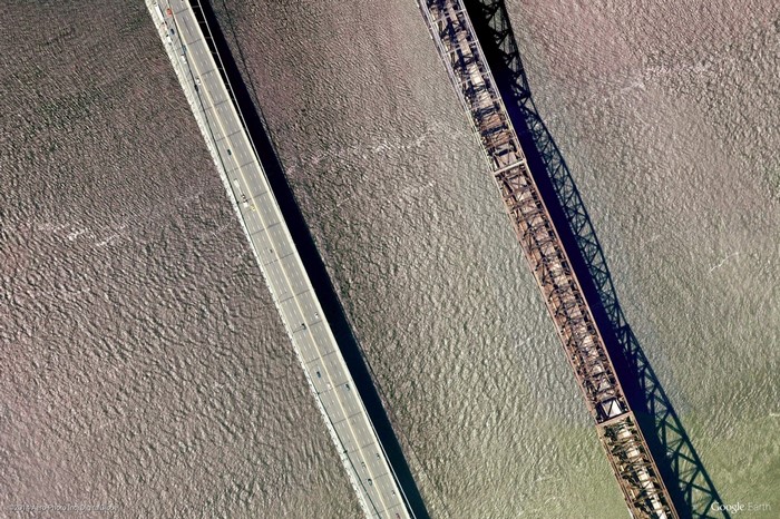 Aerial view of two bridges over water