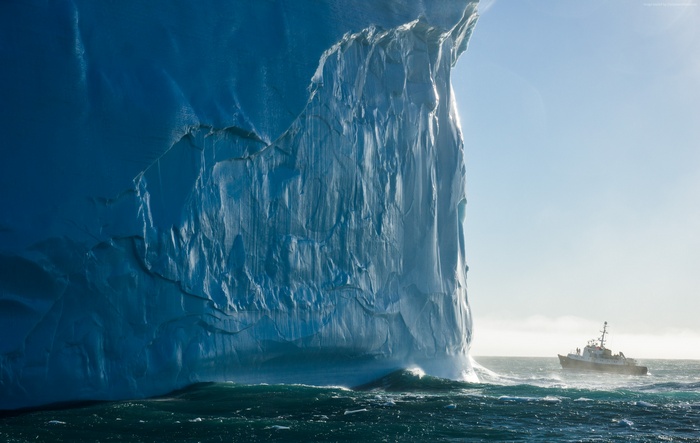 Iceberg and Ship in the Atlantic Ocean