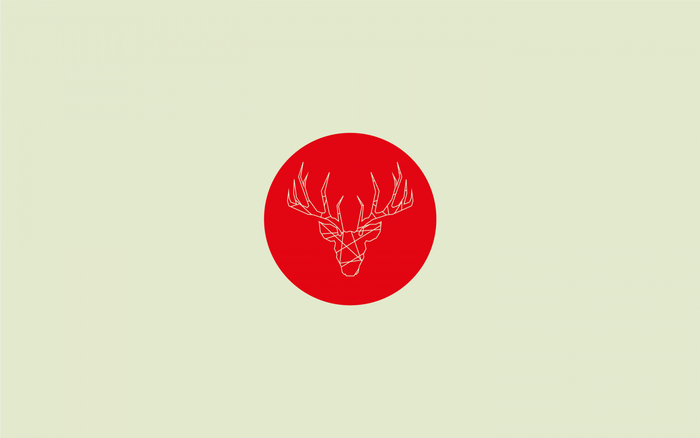 Geometric deer head inside a red circle