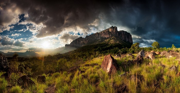 Mount Roraima plateau with dramatic clouds and sun rays