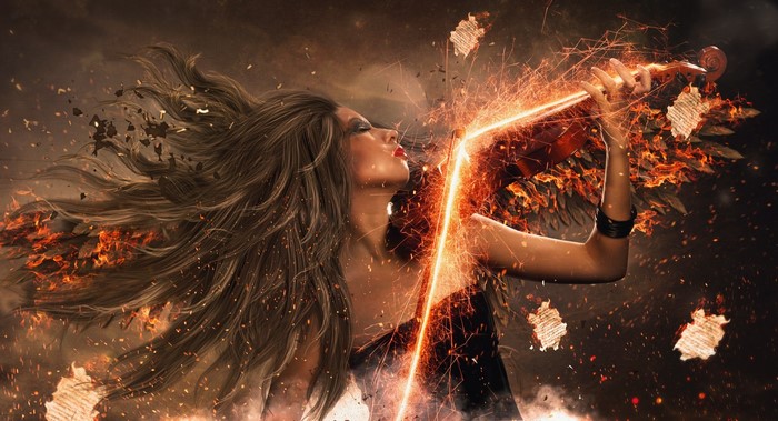 Woman playing violin with fire and sparks