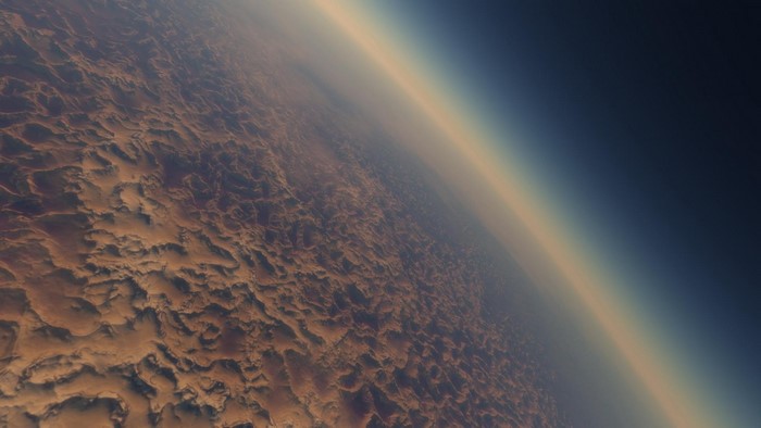 Planet surface with atmospheric haze and sunlight