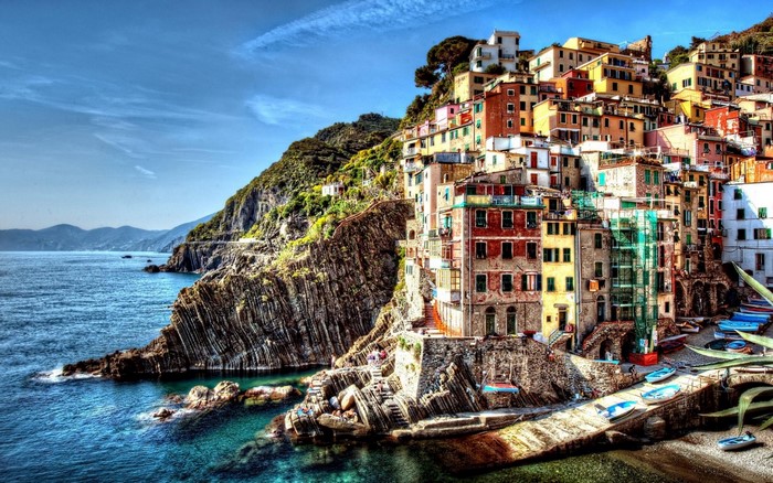 Colorful buildings on a cliffside overlooking the sea in Cinque Terre, Italy