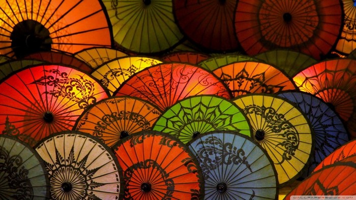 Colorful patterned umbrellas arranged in a display