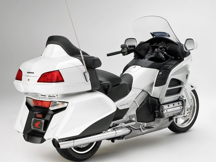 White Honda Goldwing motorcycle rear view