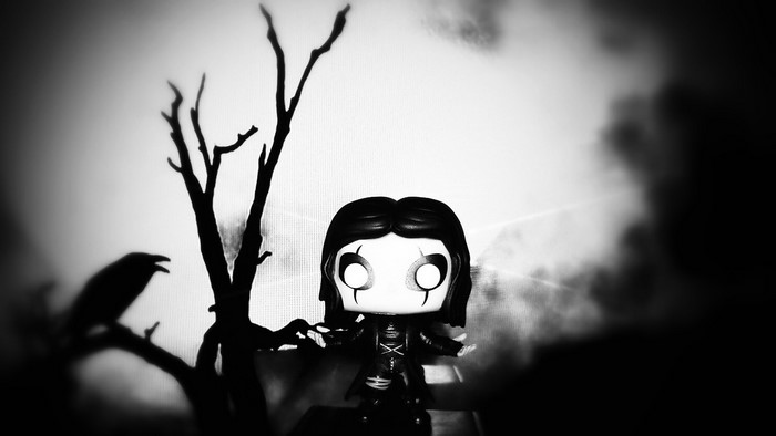 The Crow Funko Pop with a crow and tree silhouette