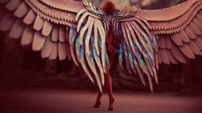 Woman with large feathered wings