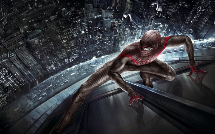Spider-Man from The Amazing Spider-Man crouches on a skyscraper