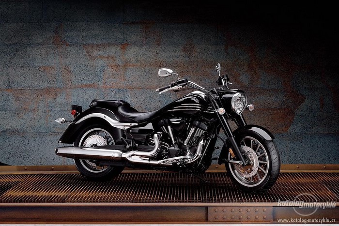 Black Yamaha XV 1900 motorcycle on a metal grate