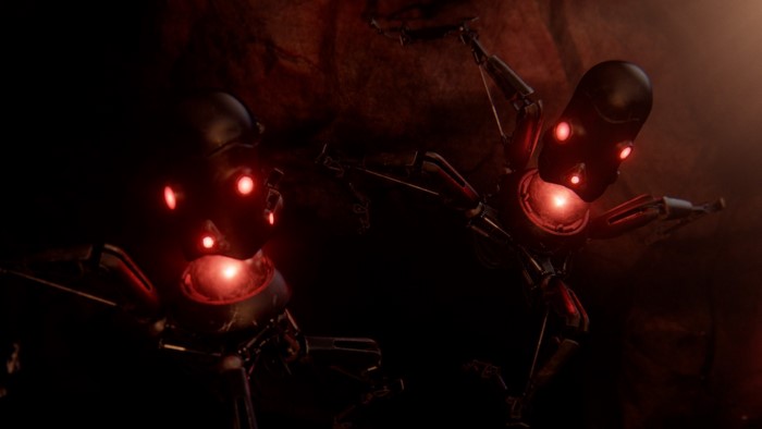 Two robots with red glowing eyes in darkness