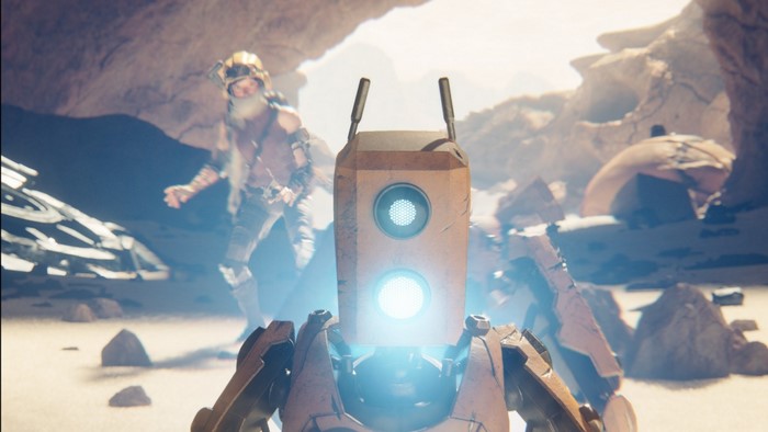 Robot and person in a desert landscape