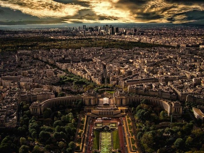 Aerial view of Paris cityscape with Eiffel Tower and modern skyline