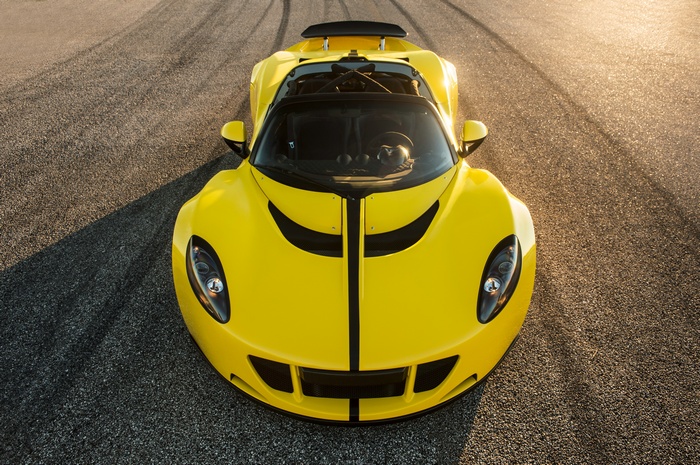 Yellow Hennessey Venom GT Spyder on asphalt