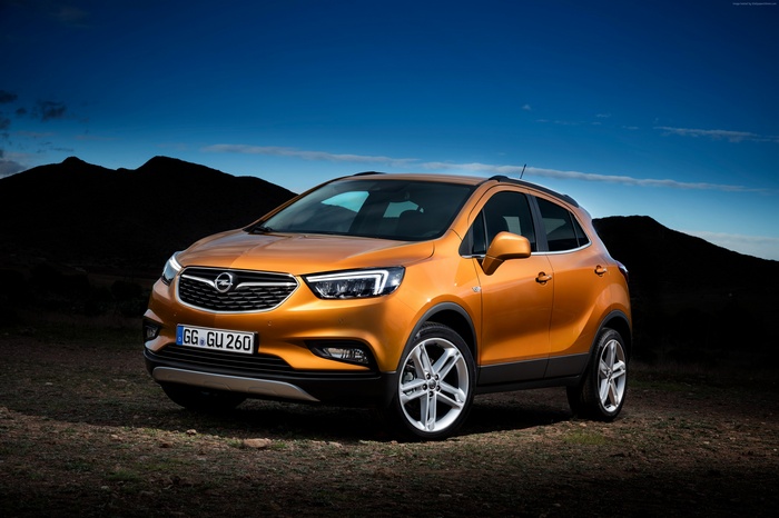Orange Opel Mokka X SUV parked outdoors