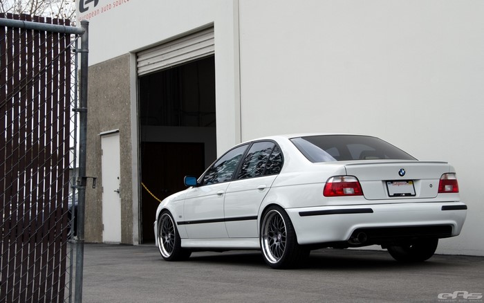 White BMW 5 Series Sedan with Custom Wheels