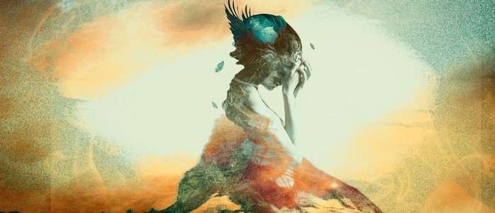Surreal double exposure of a woman with a bird and nature elements