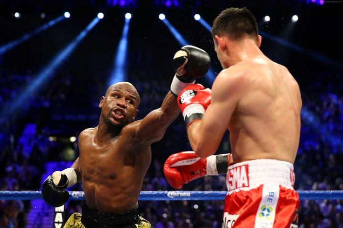Floyd Mayweather boxing in a ring