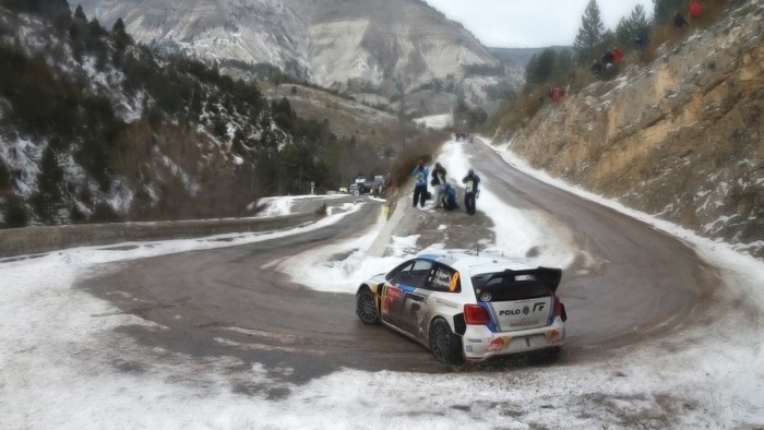 VW Polo WRC rally car on a snowy mountain road