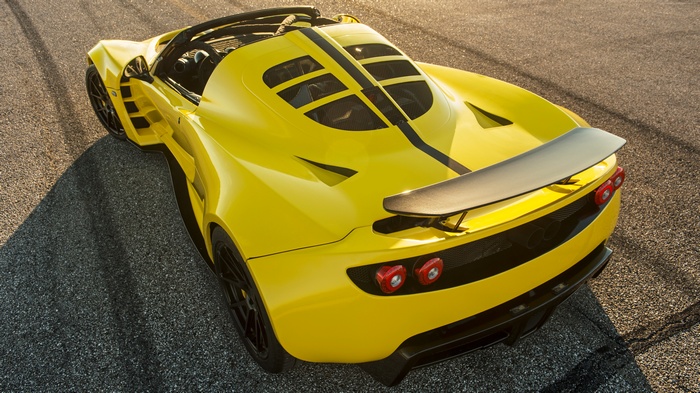 Yellow Hennessey Venom GT Spyder convertible sports car